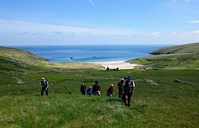 Guests walking ashore on Mingulay