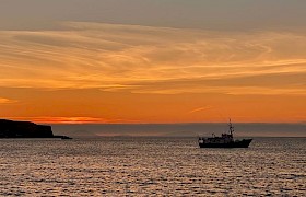 Sunset Loch Pooltiel James Fairbairns