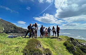 Guests ashore on the Isle of Eigg by Guide Lynsey Bland