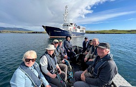 Guests with Elizabeth G by Skipper James Fairbairns