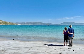 Guests at Taransay with Emma Jane in the background